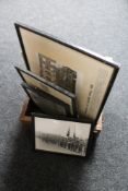A wooden box containing black and white military photographs