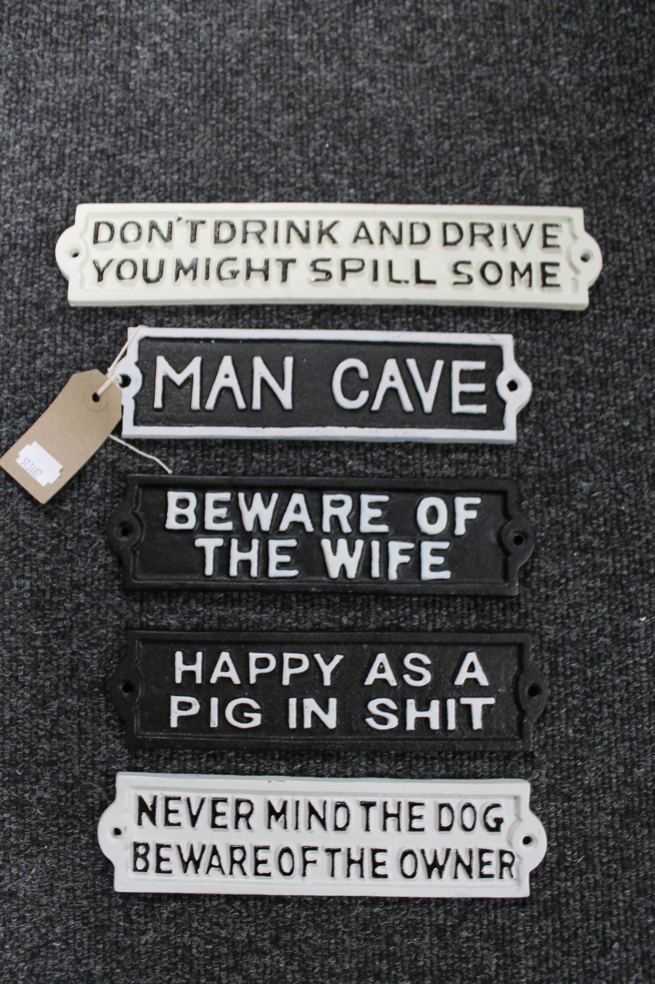 Five cast iron signs - Beware of the wife,