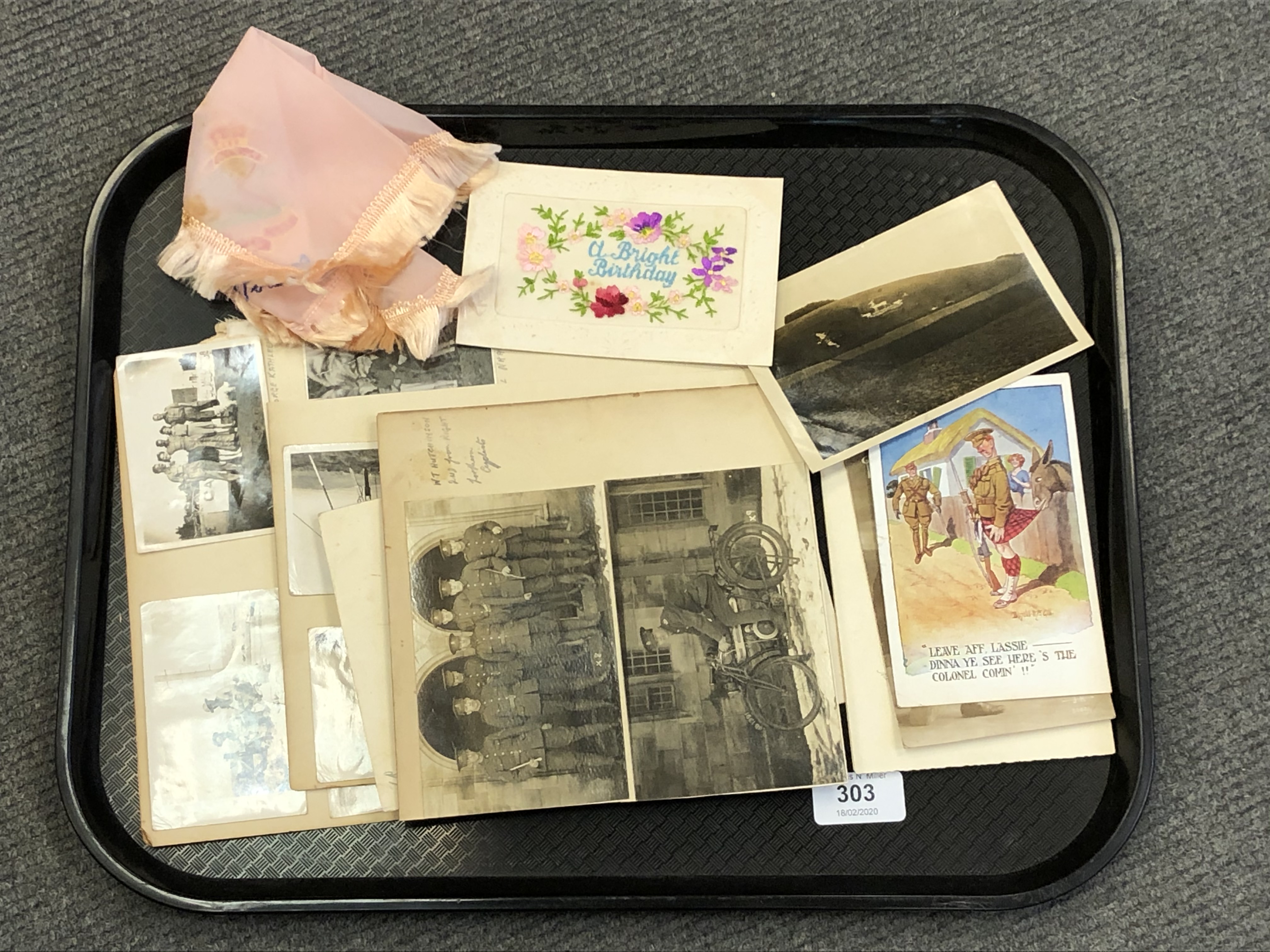 A collection of First and Second World War items including photographs, cards, Tobruck,