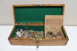 An antique oak baize lined box together with a cigar box containing coins