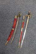 A 20th century naval sword together with an Indian sword