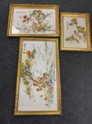 Three gilt framed Chinese silk work panels depicting birds in foliage