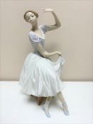 A Lladro figure - Female dancer seated