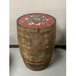 An oak coopered whisky barrel with bottle top lid