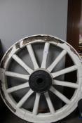 An antique cart wheel