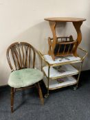 A Windsor kitchen dining chair together with a gilt three tier serving trolley and a magazine table