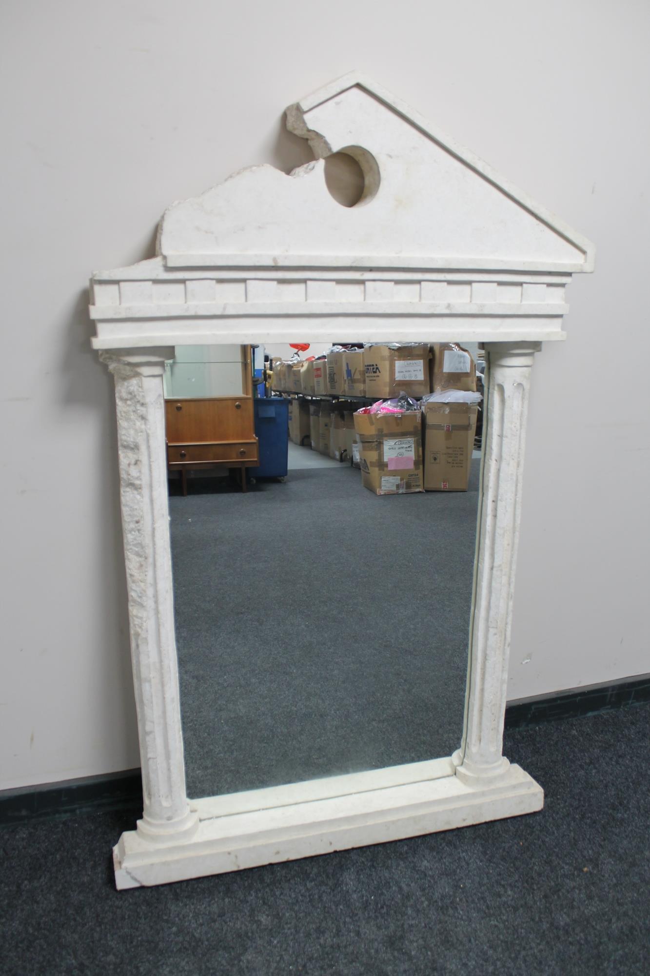 A contemporary Barker and Stonehouse stone effect Grecian mirror