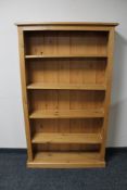 A set of pine open bookshelves,