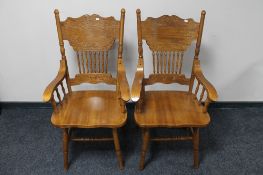 A pair of carved American style armchairs