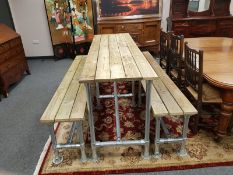 A reclaimed scaffolding table and two bench,