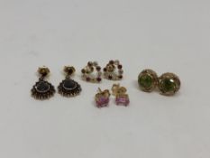 Four pairs of 9ct gold gem set earrings