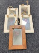 Five wood framed mirrors