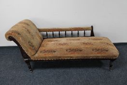 An Edwardian mahogany framed chaise longue