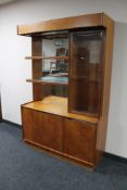 A set of mid 20th century display shelves