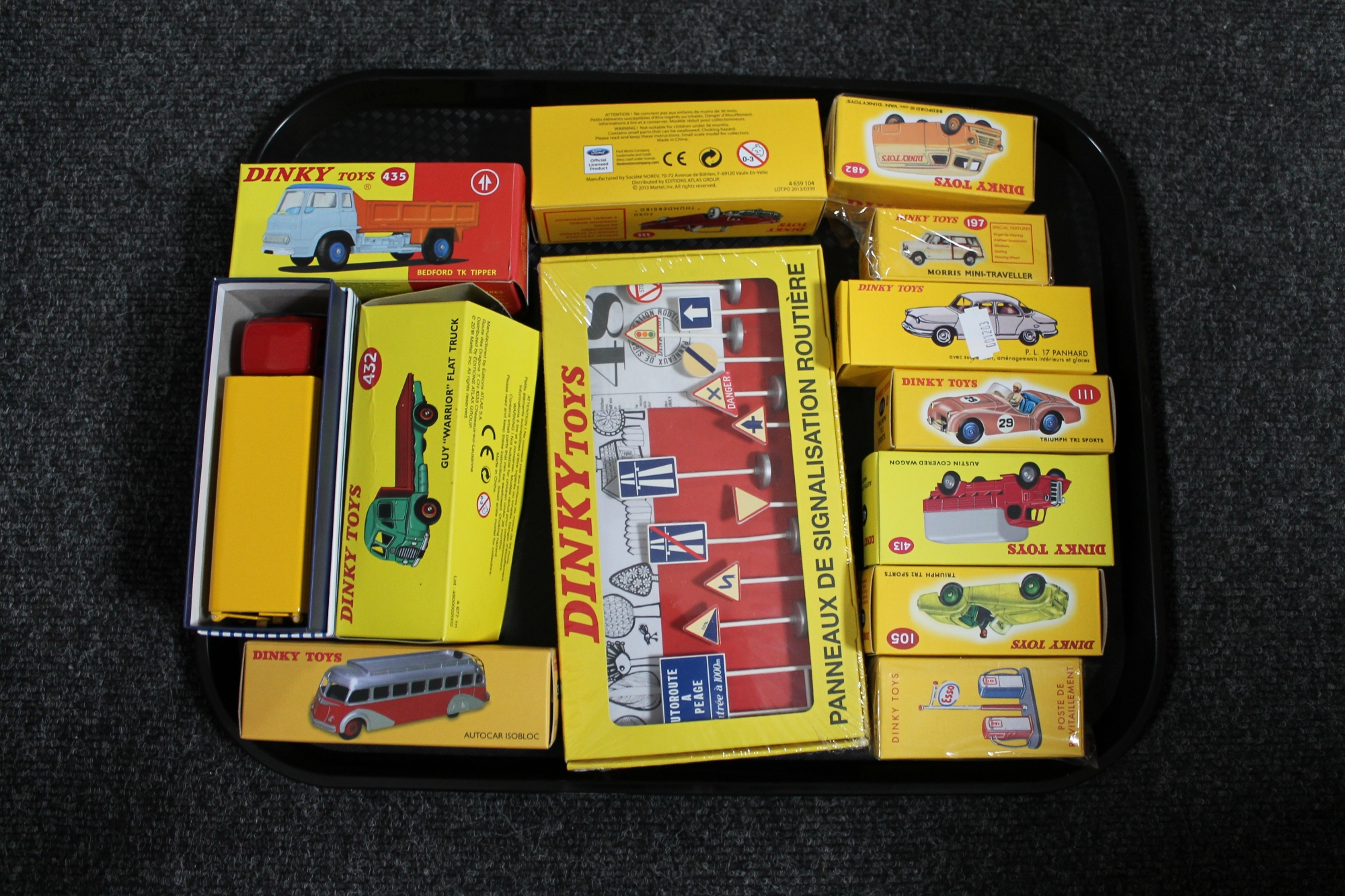 A tray of eleven Atlas Edition Dinky die cast vehicles,