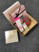 A box of six assorted lady's perfumes and perfume gift sets to include Michael Kors, Jimmy Choo,