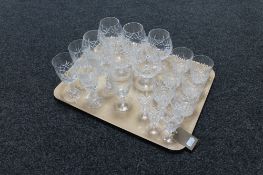 A tray of assorted lead crystal drinking glasses including liqueur,