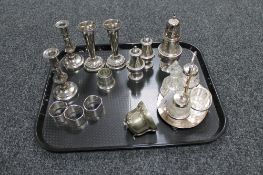 A tray of silver plated wares, sifters, set of three Beatrix Potter napkin rings, cruet stand,