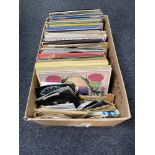 A box of a large quantity of LP's and 7" singles to include compilations, easy listening,