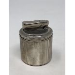 A silver table lighter