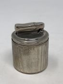 A silver table lighter