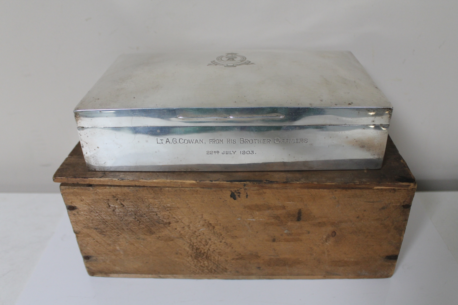 A large Edwardian silver cigarette box of Boer War interest, awarded to Lt. A. G.