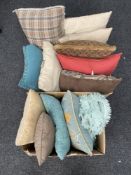 Two boxes containing twelve assorted cushions and a rug