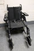 An electric wheel chair with charger