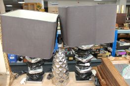 Two two-tone metal table lamps and shades and a further table lamp