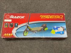 A boxed Razor Power Core E90 electric scooter