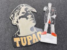 Three painted pop art cutouts; Tupac and Frankenstein, Harlequin,