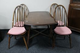 A six piece Ercol dining room suite comprising sideboard,