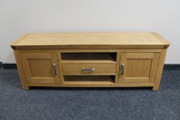 A contemporary oak entertainment stand