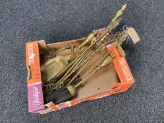 A box of assorted antique brass companion pieces and toasting forks