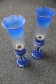 A pair of blue glass lustres with two tone shades and glass drops