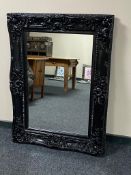 A Victorian style black framed overmantel mirror