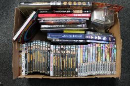 A box of James Bond and Dr Who DVD's and books plus Dr Who action figures