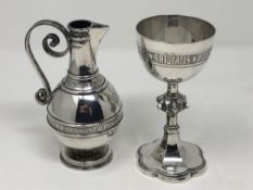 An Edwardian silver communion goblet and matching ewer engraved with Pascha Nostrum, Walker & Hall,