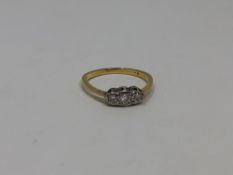 A yellow gold three stone diamond ring, size O CONDITION REPORT: 2.