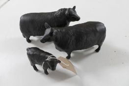 Three Beswick figures; Aberdeen Angus Bull 1562,