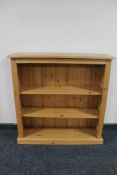 A set of pine open bookshelves,