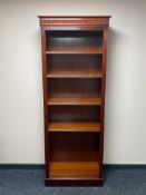 A set of reproduction open bookshelves,