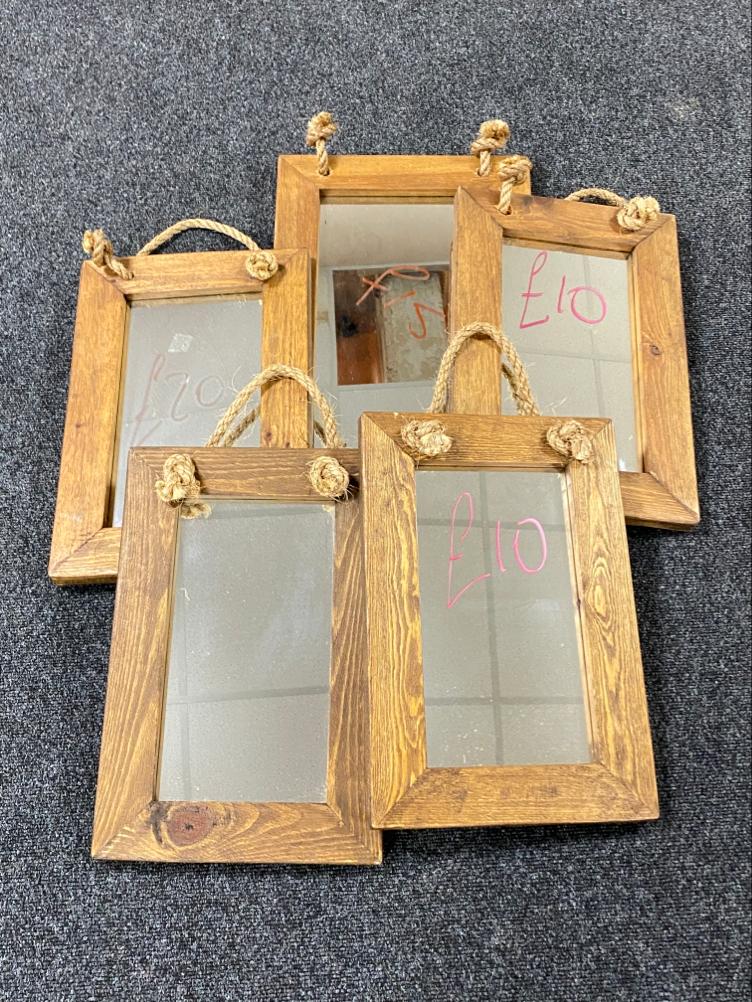 Five wood framed mirrors