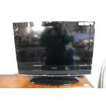A John Lewis 26 inch LCD TV with remote