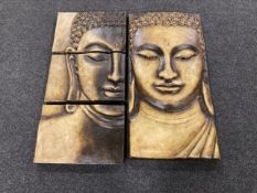 Two ceramic panels depicting Buddhas heads,