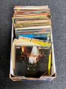 A box of LP records - Elvis Presley, Now compilations, ABBA,