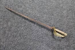 A 19th century brass handled sword with lion head pommel