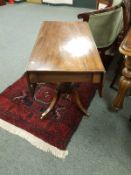 A 19th century flap sided pedestal table,