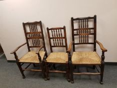 A set of eight oak rush seated country dining chairs,