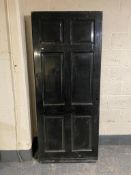 A pair of black UPVC doors